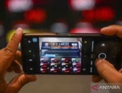 IHSG hari terakhir pekan dibuka menguat 52,08 poin